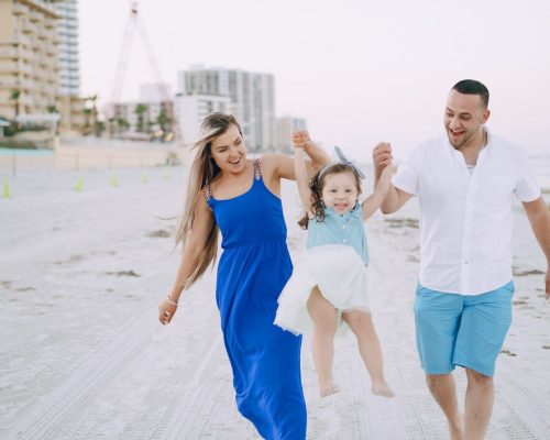 beautiful-family-beach_1157-4527